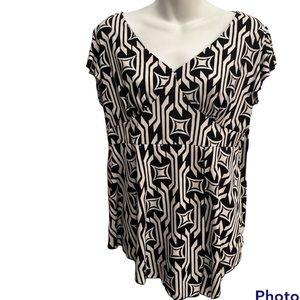 J.T.B peplum type top Black & white Size large.
